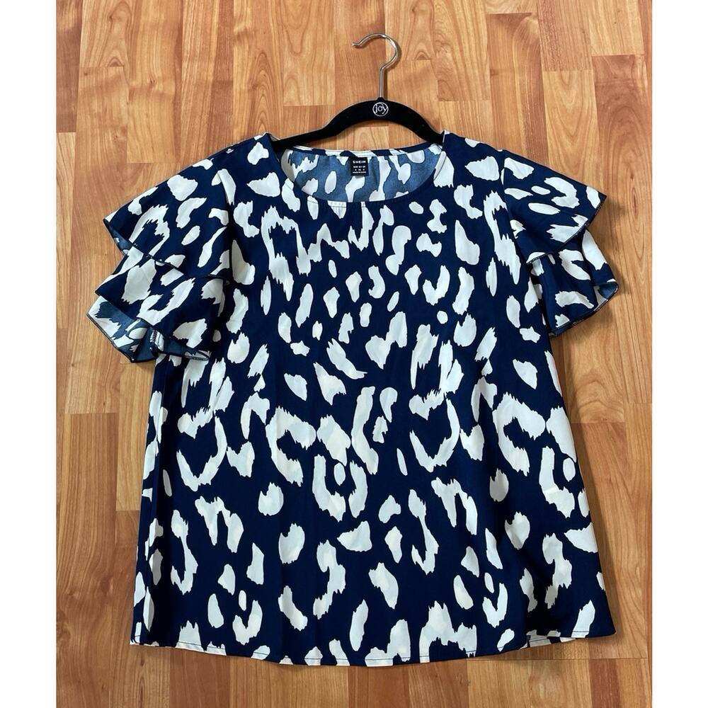 Blue and cream blouse
